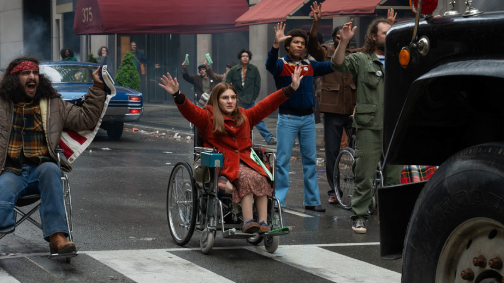 Judy Heumann and protesters in wheelchairs during disability rights activism