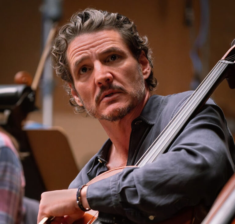 Pedro Pascal plays a cellist in the film Behemoth, looking intently at his instrument.