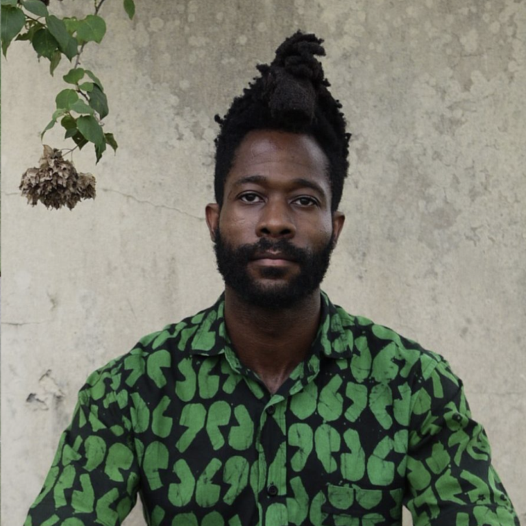 Portrait of Chuko Esiri in a green patterned shirt