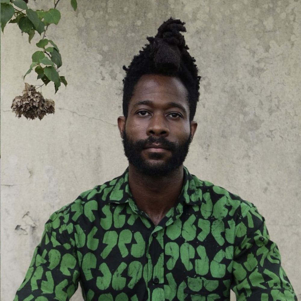 Portrait of Chuko Esiri in a green patterned shirt