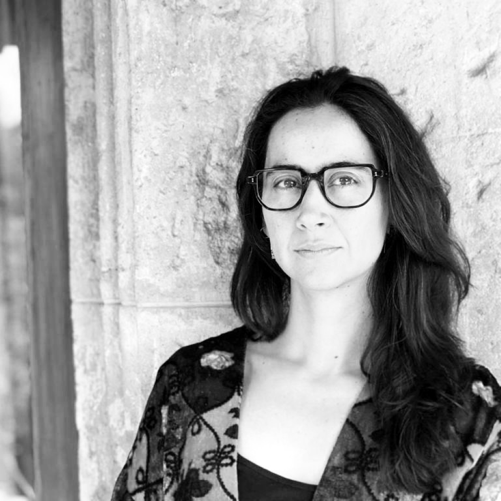 Otilia Portillo Padua wearing glasses and a patterned shawl