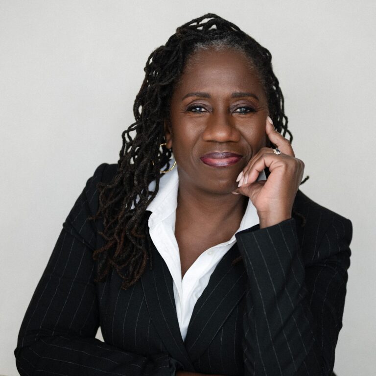 Sherrilyn Ifill, president and director-counsel of the NAACP Legal Defense Fund, in a pinstripe suit.