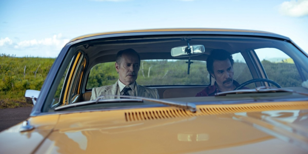 Steve Buscemi and John Turturro in a yellow car, Wild Horse Nine.