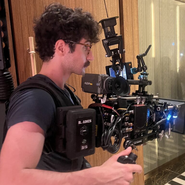 Benjamin operating a professional cinema camera rig