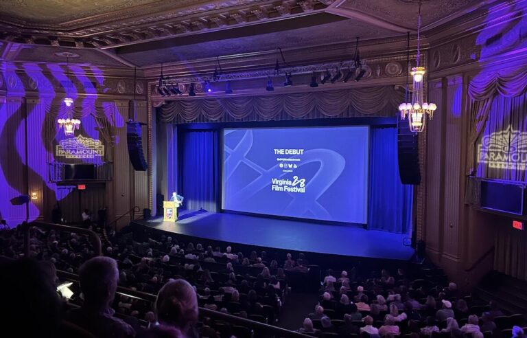 Paramount Theater stage with screen showing "The Debut" and Virginia Film Festival logo